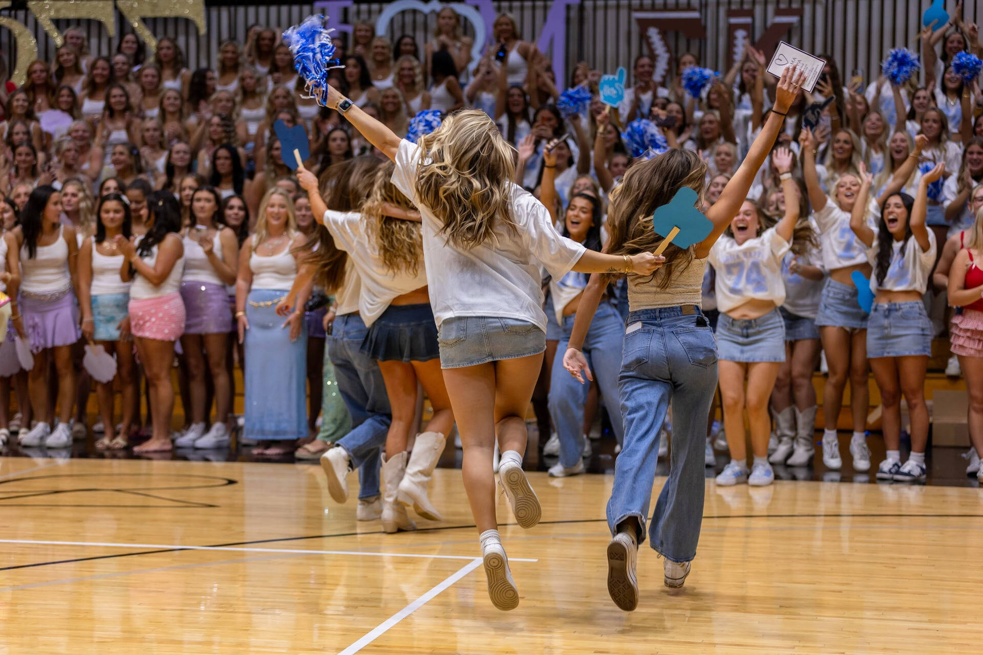 Panhellenic New Member running home on Bid Day